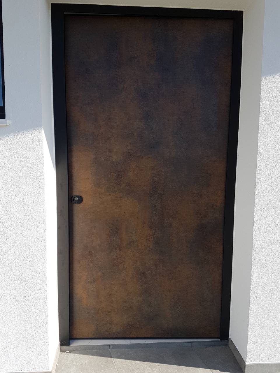 Corten steel door, weathered patina