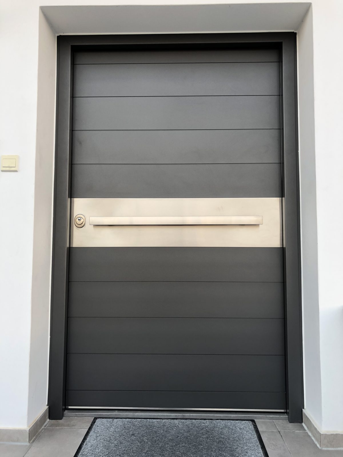 Oversized grey entrance with letter slot
