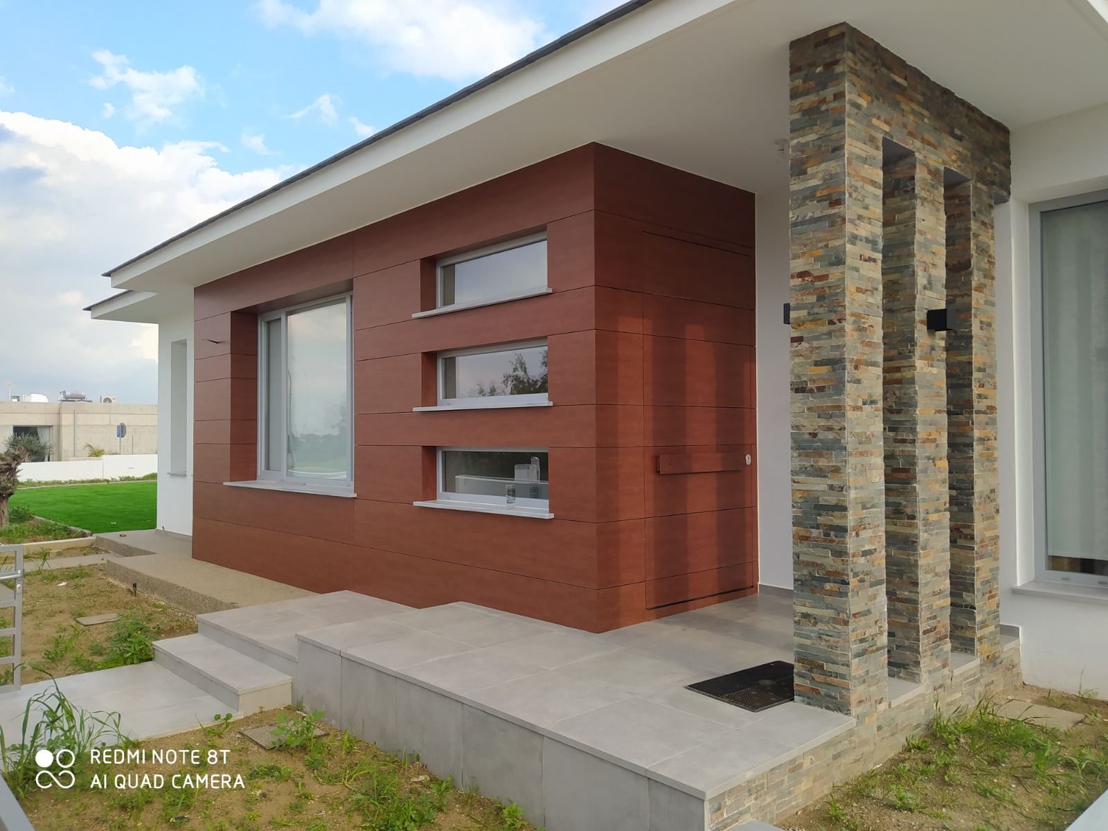 Full elevation, white window frames